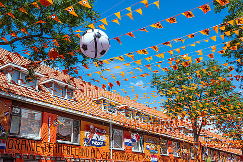 Marktweg Street in The Hague, Netherlands, is decorated ahead of the start of the soccer World Cup.