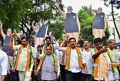 BJP National General Secretary Radha Mohan Das Agrawal, party Karnataka President BY Vijayendra and other party leaders during celebrations marking Prime Minister Narendra Modi becoming India's longest-serving elected prime minister, in Bengaluru. - | Photo: PTI