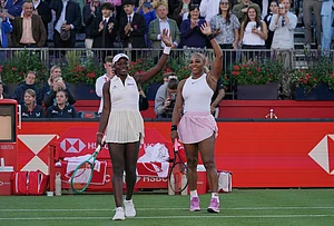 | Photo: AP/Alberto Pezzali : Serena Williams of the United States, celebrates with playing partner Victoria Mboko of Canada after defeating Nicole Melichar-Martinez of Canada and Erin Routliffe of New Zealand during their first round doubles match at the Queen's Club tennis championships in London.