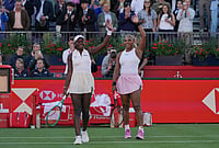 | Photo: AP/Alberto Pezzali : Serena Williams of the United States, celebrates with playing partner Victoria Mboko of Canada after defeating Nicole Melichar-Martinez of Canada and Erin Routliffe of New Zealand during their first round doubles match at the Queen's Club tennis championships in London.