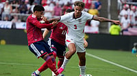 AP Photo : Costa Rica's Andrey Soto, left, grabs the shirt of England's Nico O'Reilly during an international friendly soccer match between Costa Rica and England, Wednesday.