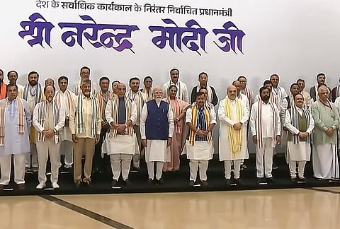 Prime Minister Narendra Modi with Union Ministers, Chief Ministers and other leaders during group photograph at a meeting of the ruling National Democratic Alliance (NDA) leaders to celebrate its government completing 12 years and Prime Minister Narendra Modi becoming the longest-serving elected PM of India, in New Delhi. 