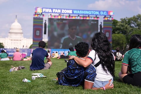 Fans watch the first match of the World Cup between Mexico and South Africa on the National Mall, Thursday, June 11, 2026, in Washington.