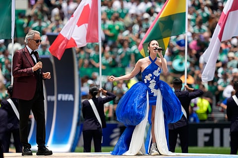 Andrea Bocelli and South Korean singer EJAE perform during the opening ceremony before the start of the World Cup Group A soccer match between Mexico and South Africa in Mexico City, Thursday, June 11, 2026.