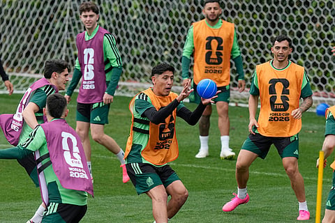 Mexico's Edson Alvarez catches a ball during training in Mexico City, ahead of Mexico's FIFA World Cup opener match against South Africa.