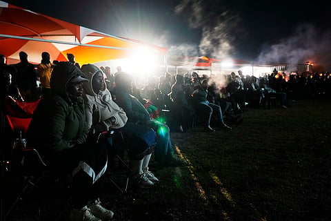 Fans watch a public viewing of the opening match of the World Cup soccer tournament between Mexico and South Africa, in Vereeniging, South Africa, Thursday, June 11, 2026.