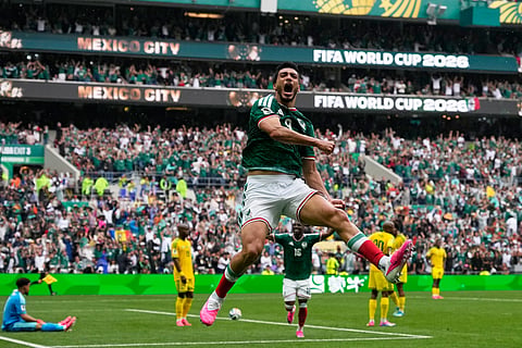 Mexico's Raul Jimenez celebrates after scoring his side's second goal during the World Cup Group A soccer match between Mexico and South Africa in Mexico City, Thursday, June 11, 2026.
