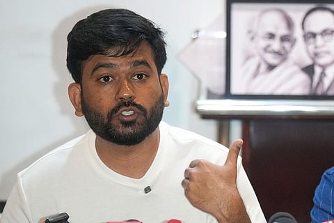 Cockroach Janata Party (CJP) Founder Abhijeet Dipke addresses a press conference ahead of a protest, in Pune, Maharashtra.