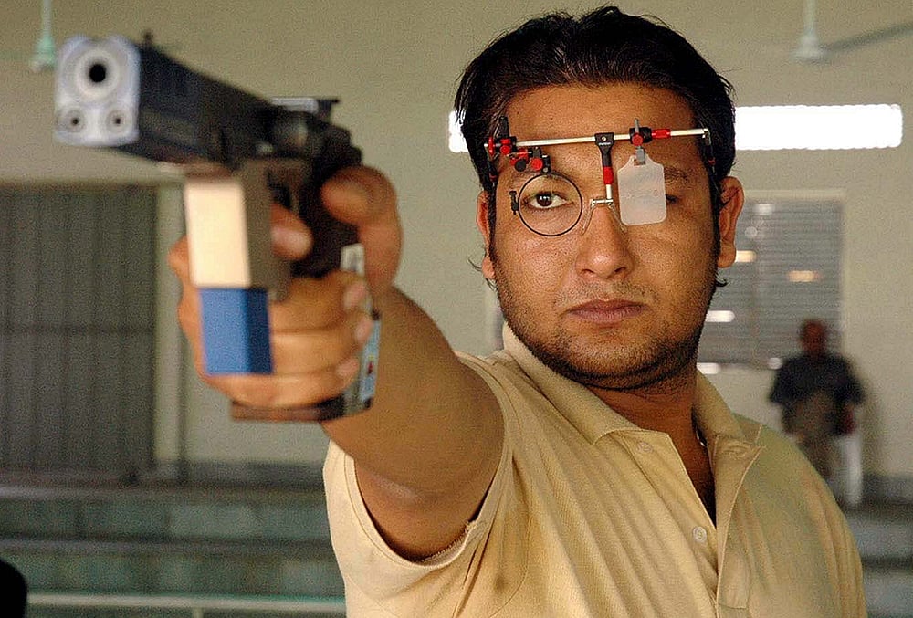 Jaspal Rana, the Asian Games gold medallist shooter who later guided Manu Bhaker to her historic double bronze-medal feat at the Paris Olympics as a coach, died at the age of 49 at a Delhi hospital on Thursday night, June 11, 2026. Rana is seen during the 4th Sajjan Singh Sethi Masters Shooting Championship, in Jalandhar, Punjab, in this file photo dated April 10, 2006.  - | Photo: PTI 