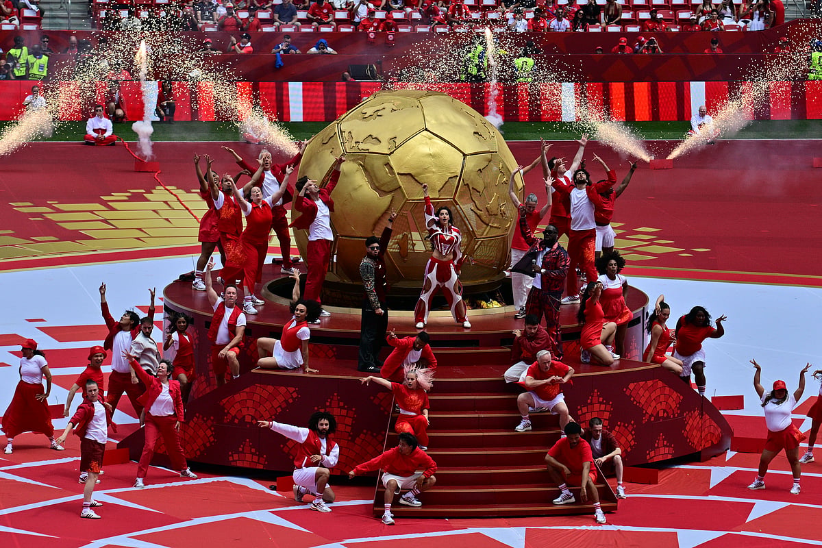 Singers perform during the opening ceremony before the World Cup Group B soccer match between Canada and Bosnia, Friday, June 12, 2026, in Toronto - Sammy Kogan/The Canadian Press via AP
