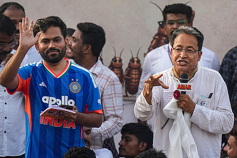 Cockroach Janta Party (CJP) founder Abhijeet Dipke along with Climate activist Sonam Wangchuk during a protest demanding Union Minister Dharmendra Pradhan's resignation, at Savitribai Phule Pune University (SPPU), in Pune, Maharashtra.