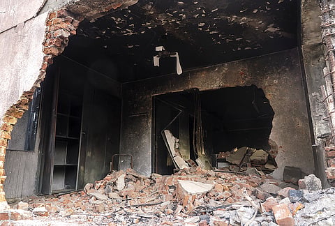 Debris lies at a damaged building at the Air India AI-171 crash site, at BJ Medical College hostel complex, Meghaninagar, in Ahmedabad, Thursday, June 11, 2026.