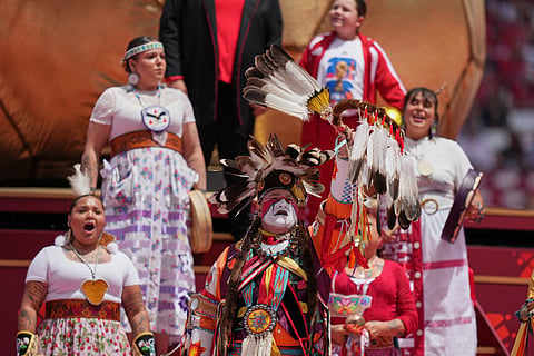 First Nation people perform during the opening ceremony for the World Cup Group B soccer match between Canada and Bosnia in Toronto, Friday, June 12, 2026.