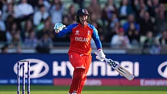 England's Danni Wyatt-Hodge celebrates reaching her century during the ICC Women's T20 World Cup, Group 2 match between England and Sri Lanka, at Edgbaston, Birmingham, England, Friday June 12, 2026. - (Mike Egerton/PA via AP)