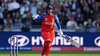 (Mike Egerton/PA via AP) : England's Danni Wyatt-Hodge celebrates reaching her century during the ICC Women's T20 World Cup, Group 2 match between England and Sri Lanka, at Edgbaston, Birmingham, England, Friday June 12, 2026.