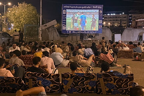 Fans gather to watch the first match of the World Cup between Mexico and South Africa at a coffee shop in Aden, Yemen, Thursday, June 11, 2026.