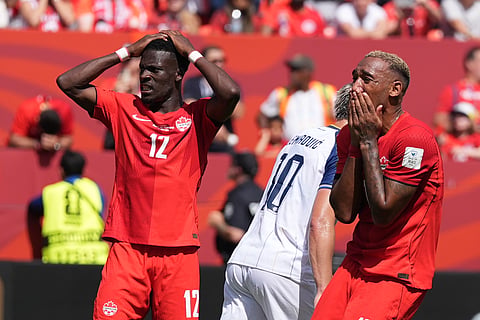 Canada's Tani Oluwaseyi, left, and teammate Derek Cornelius react after a chance to score was missed during their FIFA World Cup 2026, Group B match against Bosnia in Toronto, Friday, June 12, 2026.