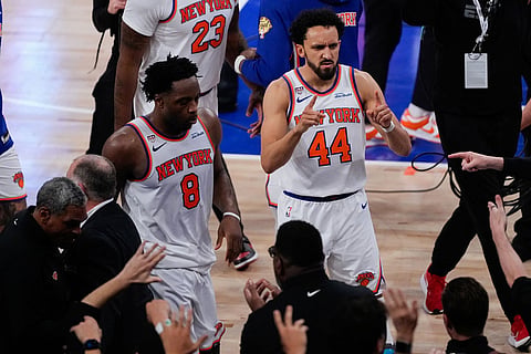 New York Knicks guard Landry Shamet (44) celebrates towards fans after Game 4 of the NBA Finals basketball series against the San Antonio Spurs in New York.