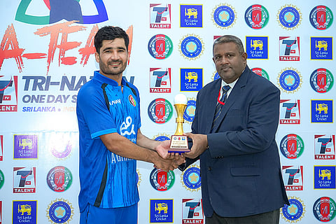 In this image received on June 11, 2026, Afghanistan's captain Imran receives the 'Player of the Match' award during the presentation ceremony after an ODI cricket match between India-A and Afghanistan-A, in Dambulla, Sri Lanka.