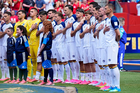 Bosnia players sing during the national anthem before the World Cup Group B soccer match between Canada and Bosnia, Friday, June 12, 2026, in Toronto.