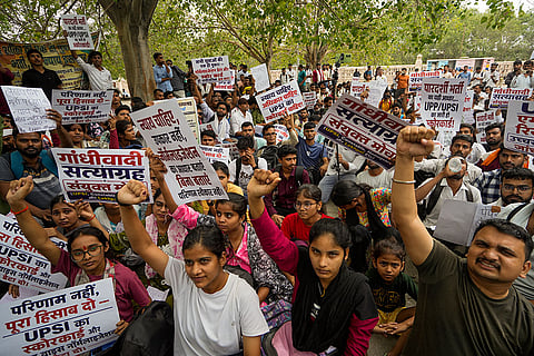 Supporters of Cockroach Janata Party (CJP) take part in a protest demanding resignation of Union Education Minister Dharmendra Pradhan over alleged examination-related lapses, at Eco Garden, in Lucknow, Uttar Pradesh.