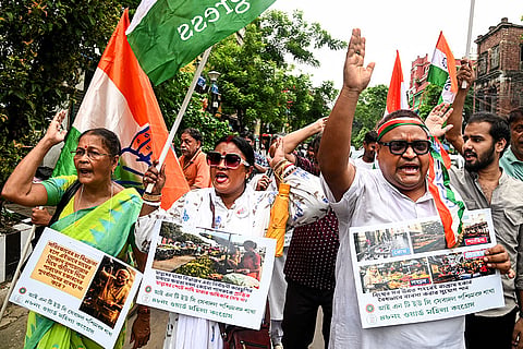 Indian National Trade Union Congress (INTUC) members stage a protest over the eviction of hawkers, in Kolkata.