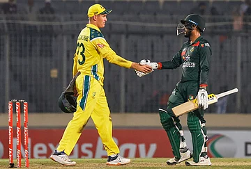 | Photo: AP/Mosaraf Hossain : Bangladesh's captain Mehidy Hasan Miraz shakes hands with Australia's Marnus Labuschagne after winning the second one day international cricket match against Australia in Mirpur, Bangladesh.