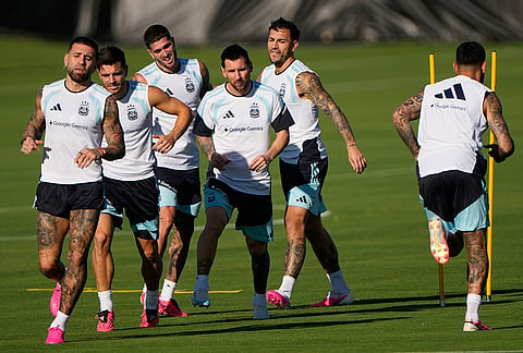 Argentina's Lionel Messi, fourth from left, practices with teammates for the FIFA World Cup soccer tournament in Kansas City, Kansas.