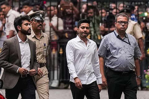 TMC MP Abhishek Banerjee arrives to appear before the West Bengal CID to face questions in the signature forgery case over the party's choice of Leader of Opposition in the state assembly, at Bhabani Bhawan in Kolkata.