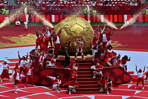 Singers Sanjoy, Nora Fatehi and Vegedream, center, perform during the opening ceremony before the World Cup Group B soccer match between Canada and Bosnia, Friday, June 12, 2026, in Toronto.
