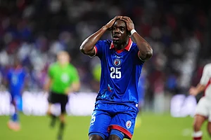 AP : The jersey featured blue to mirror the sea and red for the nation’s “strength and passion,” the sportswear maker said