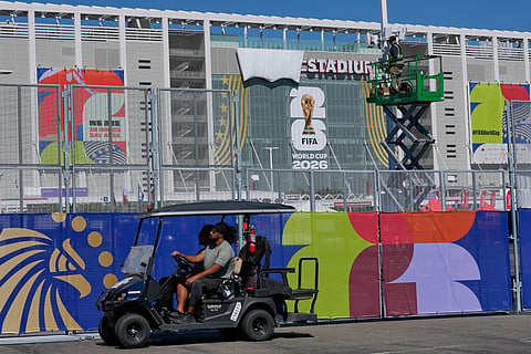 Staff members work as stadium preparations continue, Thursday, June 11, 2026, in Santa Clara, Calif., near San Francisco, ahead of the World Cup Group B soccer match between Qatar and Switzerland.