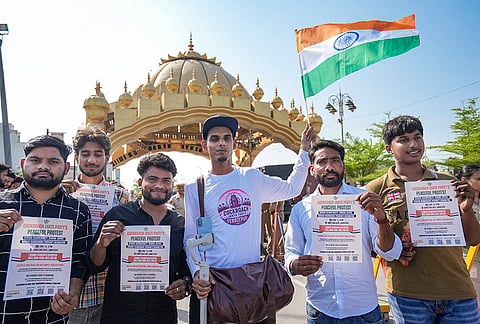 Supporters of Cockroach Janata Party (CJP) take part in a protest demanding resignation of Union Education Minister Dharmendra Pradhan over alleged examination-related lapses, in Amritsar, Punjab.