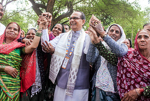 Union Agriculture Minister Shivraj Singh Chouhan participates in a plantation drive on the concluding day of the five-day BRICS Summit, in Indore, Madhya Pradesh.