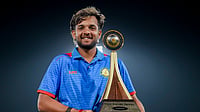 | Photo: PTI/Shailendra Bhojak : Vidarbha's captain Harsh Dubey poses with the trophy after Vidarbha won the Vijay Hazare Trophy 2025-26, at BCCI Centre of Excellence, in Bengaluru, Karnataka.