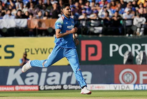 India's Gurnoor Brar after bowling a delivery during the first ODI cricket match between Afghanistan and India in Dharamshala.