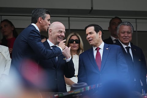 US Secretary of State Marco Rubio, right, FIFA President Gianni Infantino, center, and Paraguayan President Santiago Pena talk prior to the World Cup Group D soccer match between the United States and Paraguay in Inglewood, Calif., near Los Angeles, Friday, June 12, 2026.