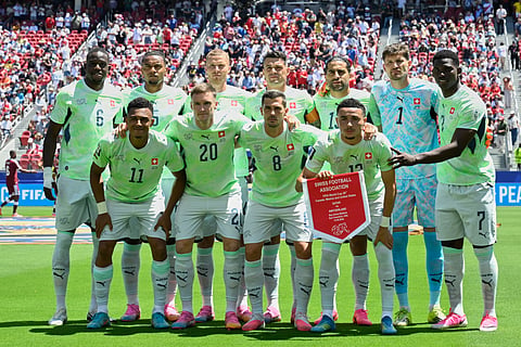 Switzerland starting XI lines up for a photo before the kick-off of their FIFA World Cup 2026, Group B match against Qatar in Santa Clara, Calif., near San Francisco, Saturday, June 13, 2026.