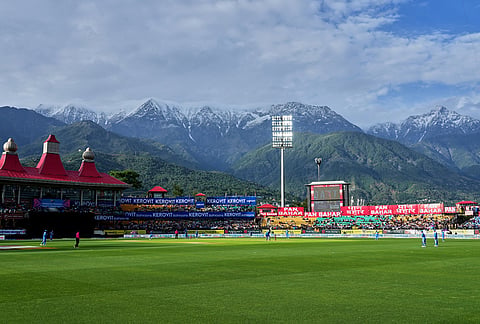 India's Gurnoor Brar, left, bowls a delivery during the first ODI cricket match between Afghanistan and India in Dharamshala.