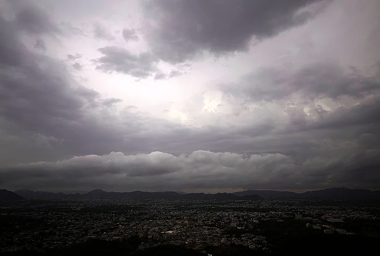 Dark clouds hover over the city during the pre-monsoon season, in Ajmer, Rajasthan. - | Photo: PTI