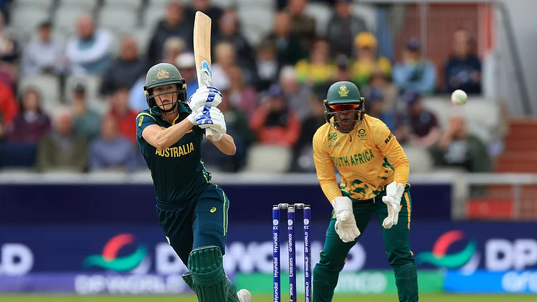 Australia's Ellyse Perry bats during the Women's T20 World Cup match between Australia and South Africa at Old Trafford, Manchester, England, Saturday June 13, 2026. - (Nigel French/PA via AP)