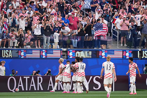 USA players celebrate after their first goal during the World Cup Group D soccer match between the United States and Paraguay in Inglewood, Calif., near Los Angeles, Friday, June 12, 2026.