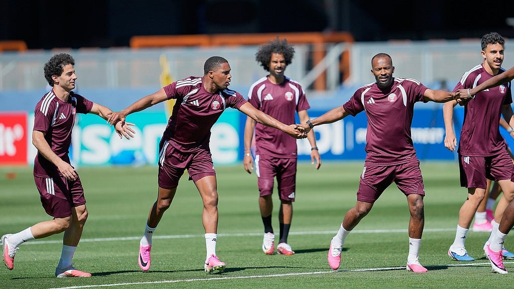 Qatar players warm up during a training session, Friday, June 12, 2026, in San Jose, Calif., near San Francisco, ahead of the World Cup Group B soccer match between Qatar and Switzerland. - AP Photo