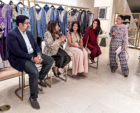 Fashion designer Payal Singhal, second left, speaks during a panel discussion hosted by South Asian Fashion Week (SAFW) and The Culture Tree at the launch of Pernia's Pop-Up Studio's flagship store on Madison Avenue, in New York City. 