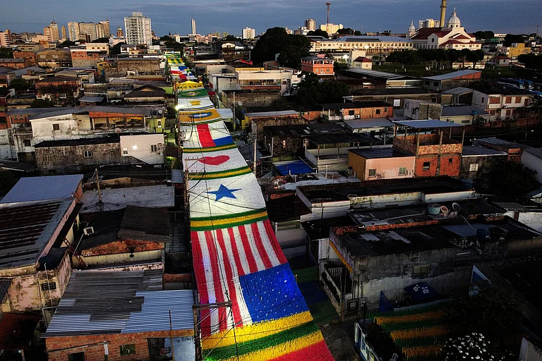 A decorated street is seen at dawn as residents prepare to watch the World Cup match between Brazil and Morocco in Manaus, Brazil, Saturday, June 13, 2026. - AP Photo/Edmar Barros