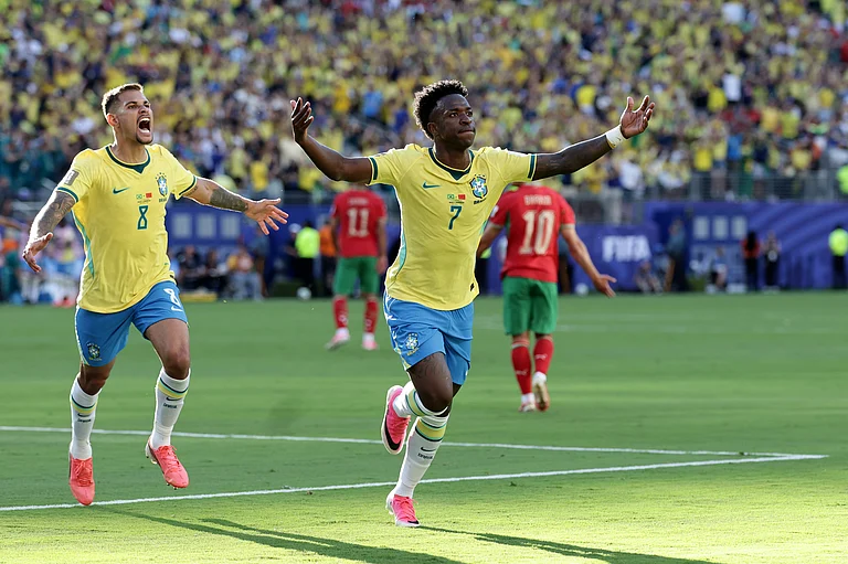 Brazil's Vinicius Junior (7) celebrates a goal in the first half during the World Cup Group C soccer match between Brazil and Morocco in East Rutherford, N.J., near New York, Saturday, June 13, 2026. - AP Photo/Adam Hunger