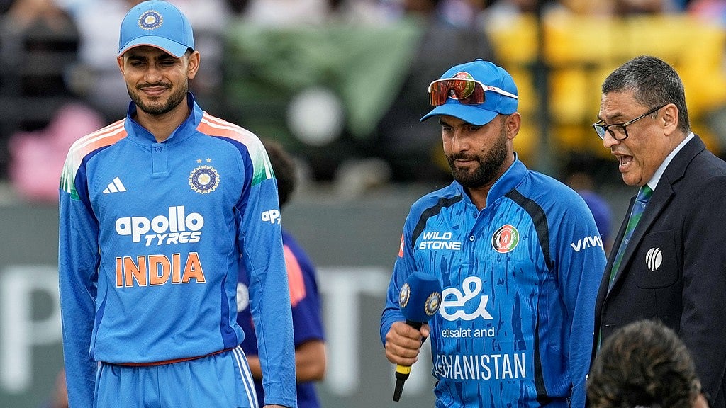 India's captain Shubman Gill, left, and Afghanistan's captain Hashmatullah Shahidi look after the coin toss ahead of the first ODI cricket match between Afghanistan and India in Dharamshala, India, Saturday, June 13, 2026.  - AP Photo/Ashwini Bhatia