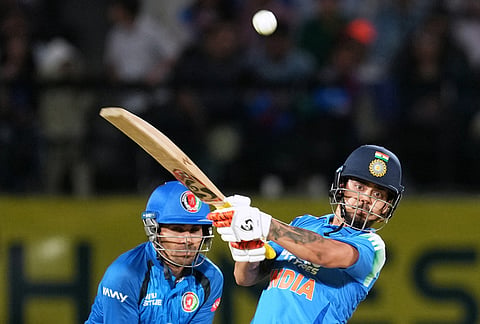 India's Ishan Kishan plays a shot during the first ODI cricket match between Afghanistan and India in Dharamshala.
