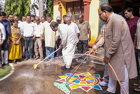 Union Education Minister Dharmendra Pradhan participates in a cleanliness drive at Shri Nageshwar Mahadev Temple as part of activities marking the completion of 12 years of the NDA government, in Bhopal, Madhya Pradesh. 