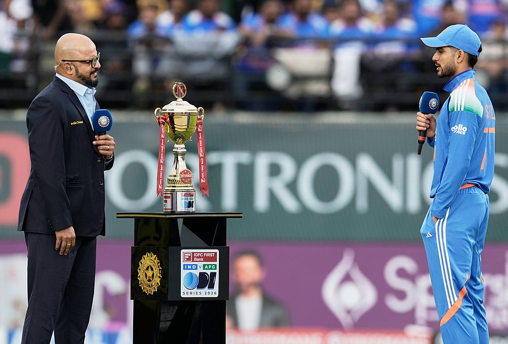 India's captain Shubman Gill speaks to the commentator Murli Karti after the toss ahed of the first ODI cricket match between Afghanistan and India in Dharamshala. - | Photo: AP/Ashwini Bhatia